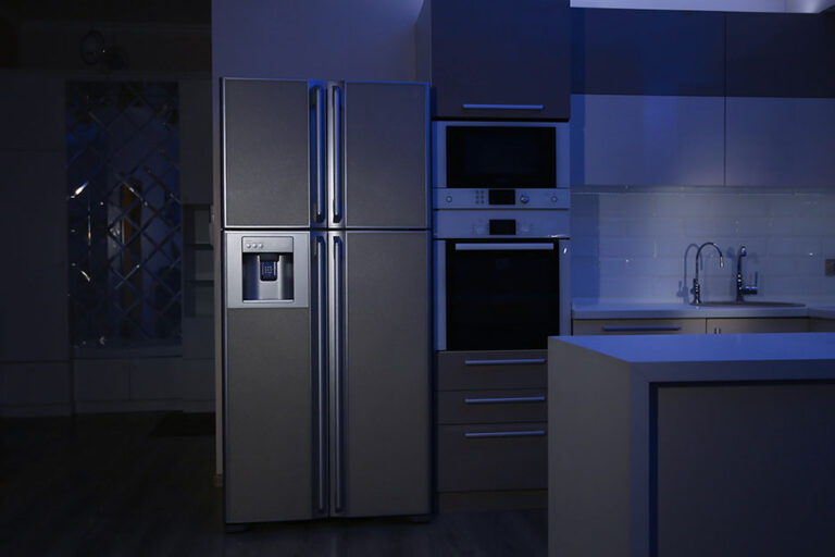 Home appliances affected by a power outage, including washing machine and refrigerator turned off