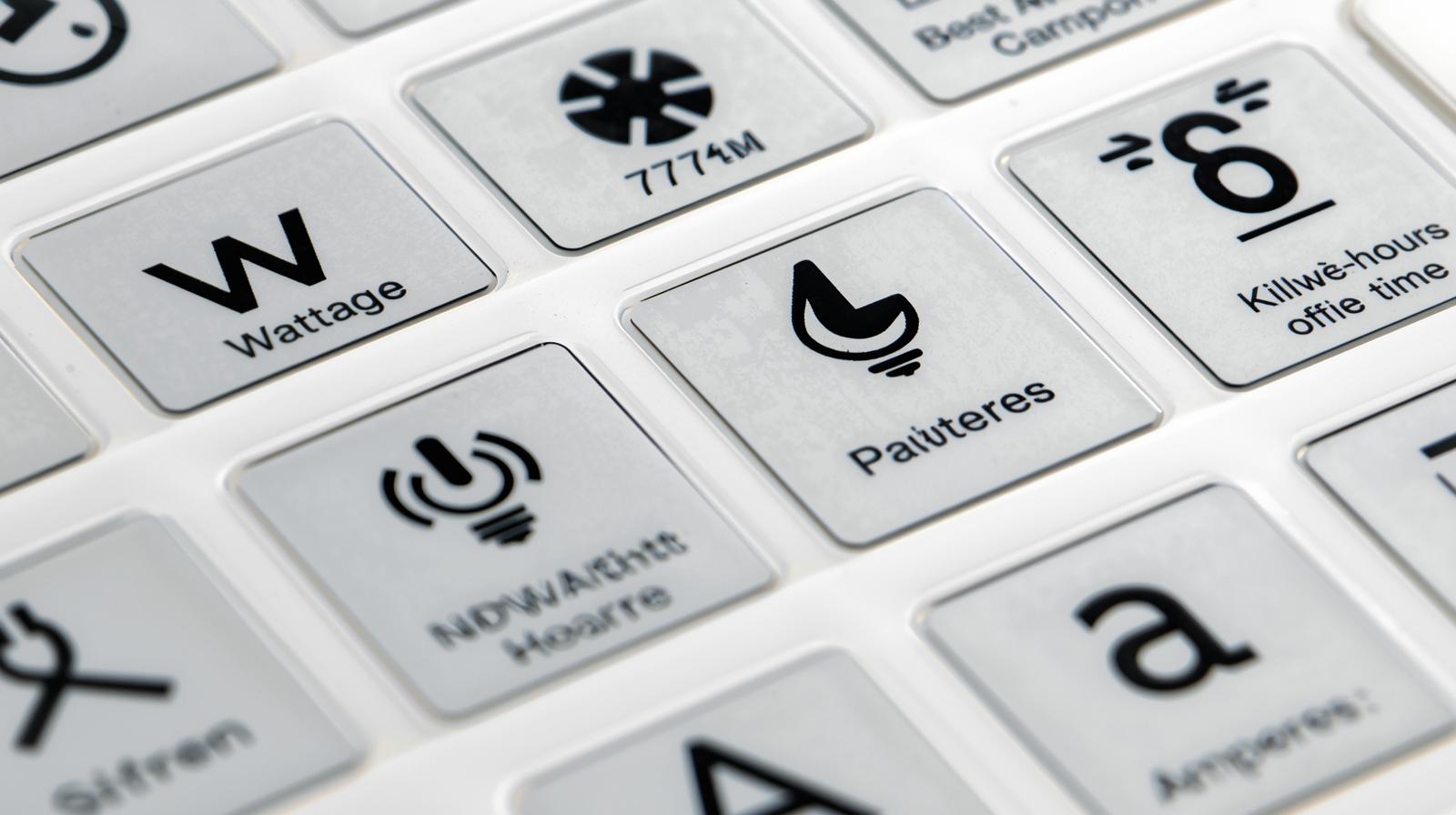 Appliance power label showing watts, kilowatt-hours, and amperage values explained